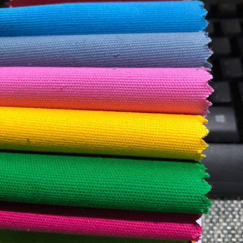 Vải bố dệt từ sợi tổng hợp từ sợi polyester và nylon